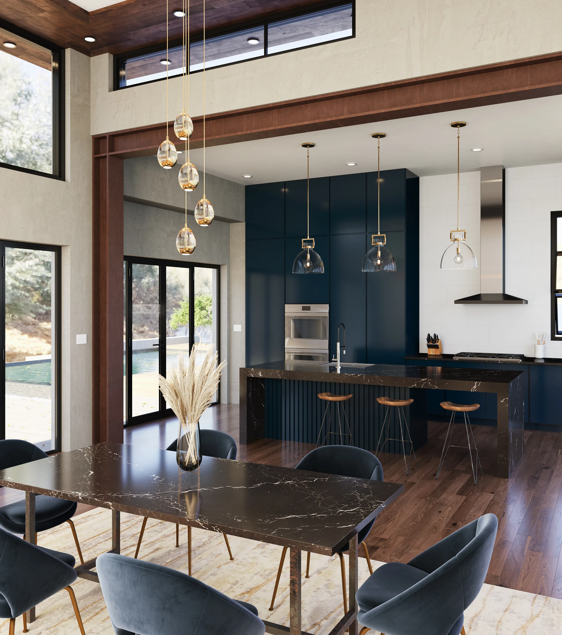 a beautiful space with a kitchen in the back with blue cabients, and Delamere hallow quartz island, with three bar stools, and gorgeous dining room table made from the same Delamere quartz and six blue dining room tables around it.