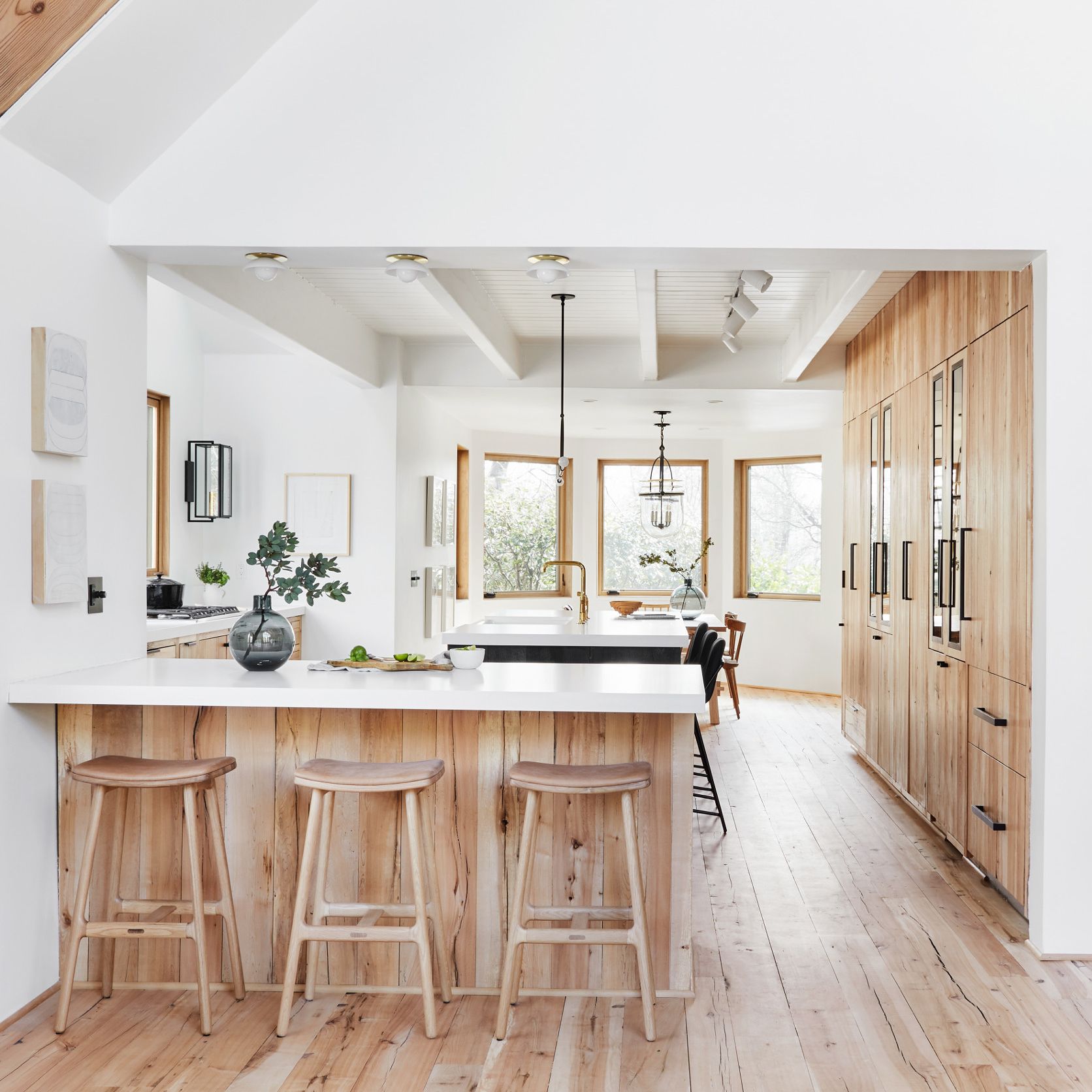 A room with a wooden floor
Description automatically generated