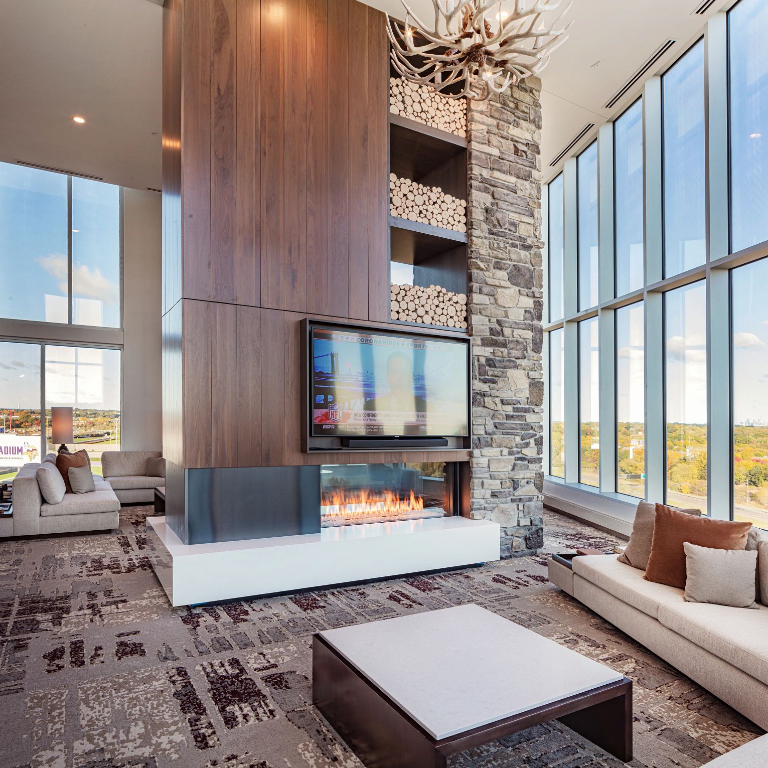 A living room with a fireplace
Description automatically generated with medium confidence