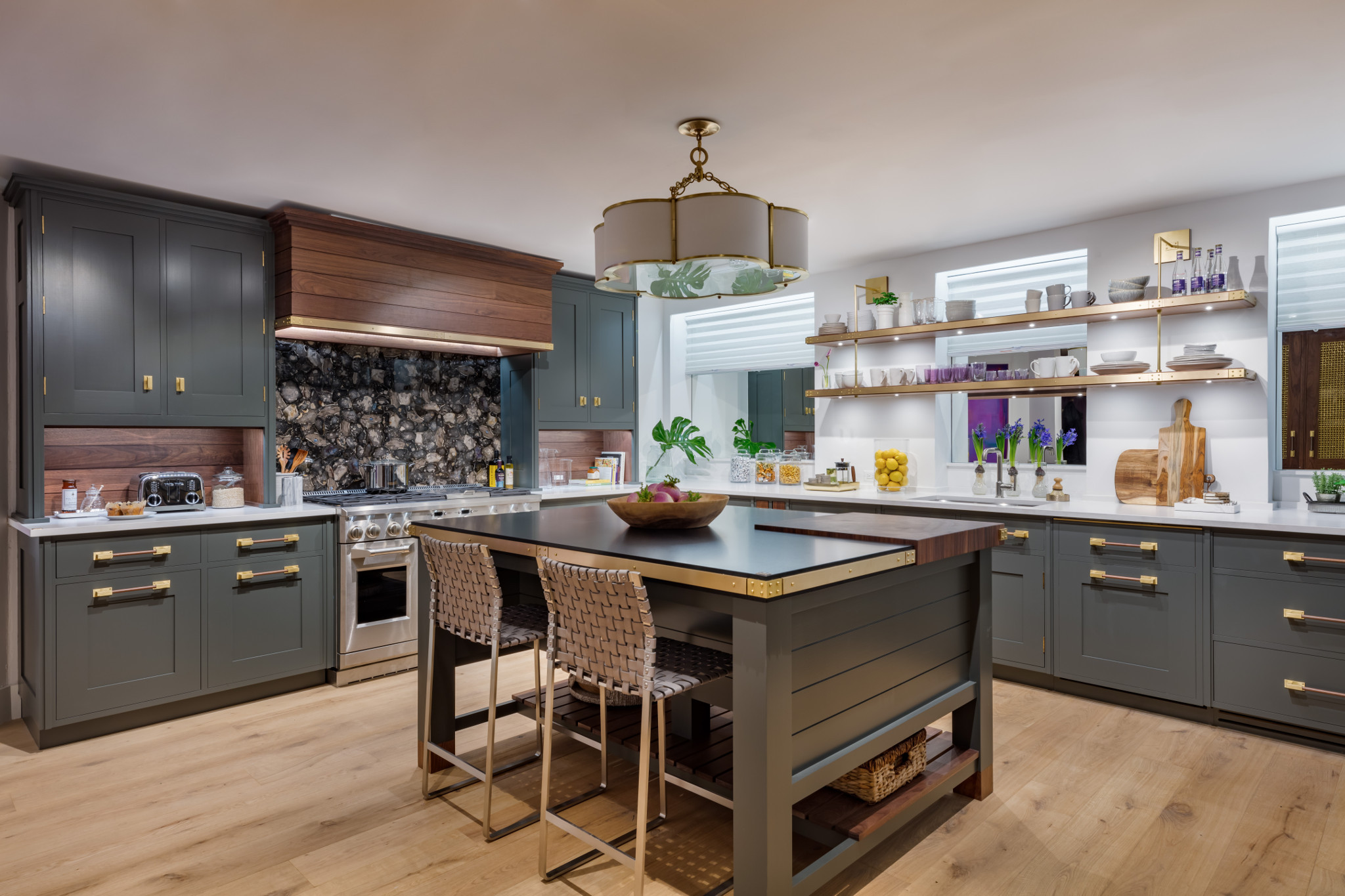 A kitchen with a wood floor
Description automatically generated
