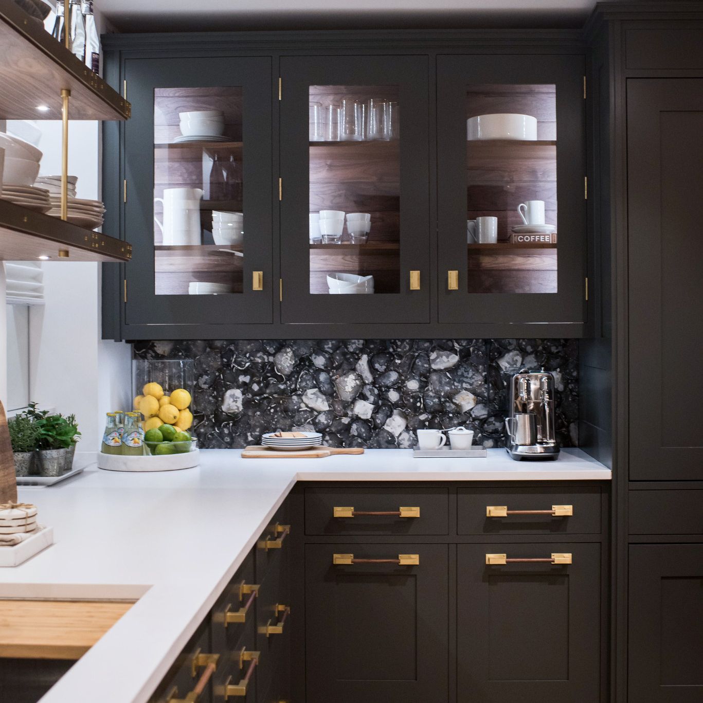 A kitchen with black cabinets

Description automatically generated with medium confidence
